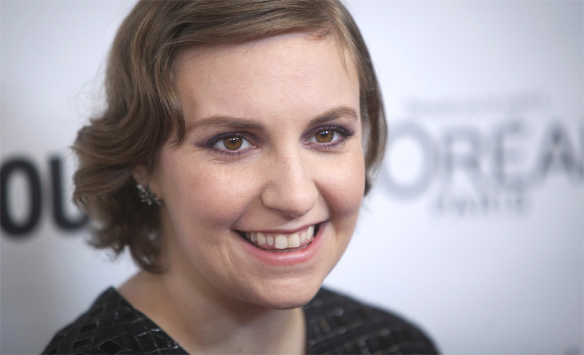 Actress Lena Dunham arrives for Glamour Magazine's "Women Of The Year" event in New York, November 11, 2013. REUTERS/Carlo Allegri (UNITED STATES - Tags: ENTERTAINMENT MEDIA) - RTX15A2I