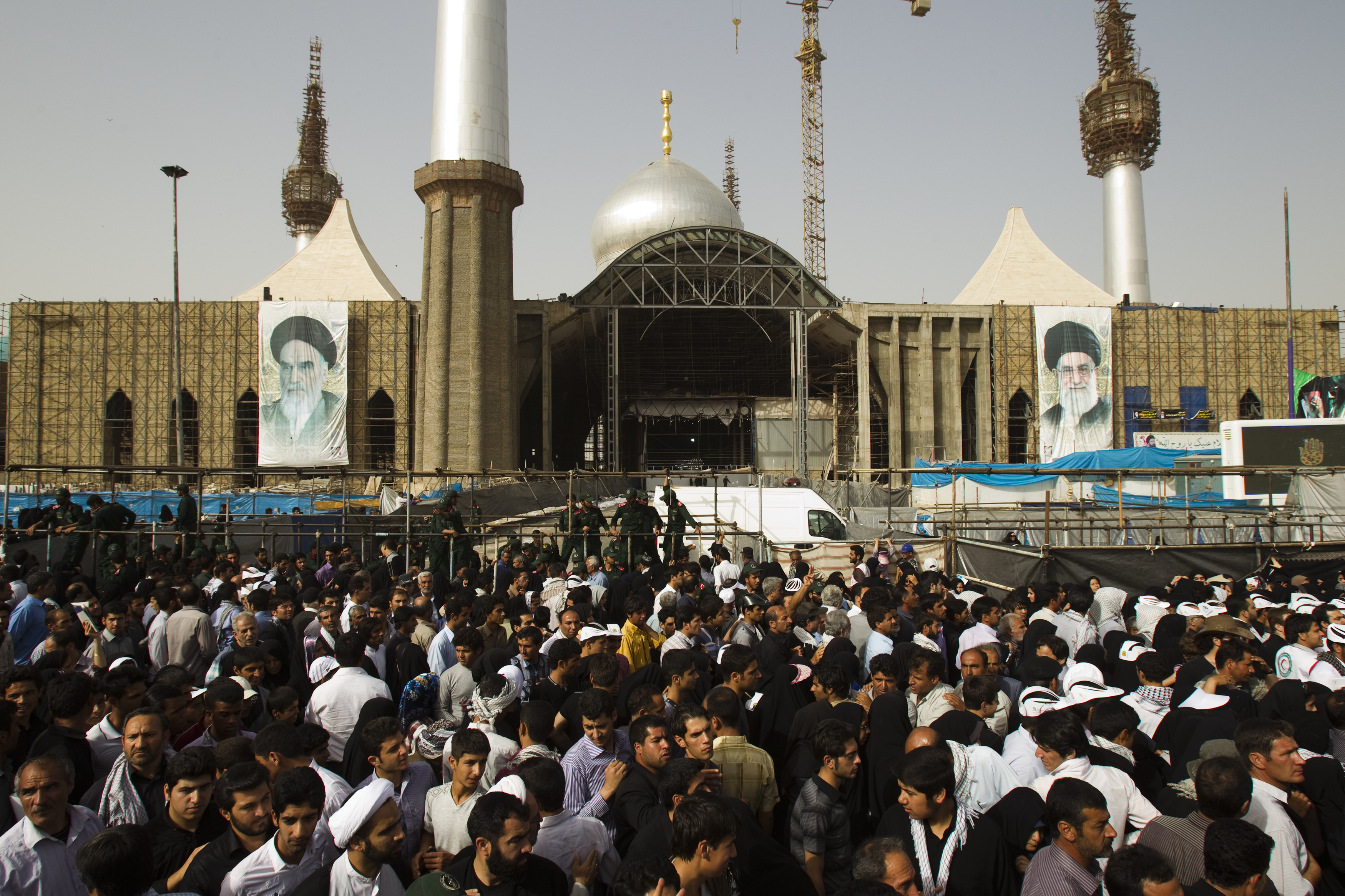 EDITORS' NOTE: Reuters and other foreign media are subject to Iranian restrictions on their ability to film or take pictures in Tehran. A general view of Iran's late leader Ayatollah Ruhollah Khomeini's shrine with pictures of him (L) and Iran's Supreme Leader Ayatollah Ali Khamenei in the Behesht Zahra cemetery, south of Tehran June 4, 2011. REUTERS/Raheb Homavandi (IRAN - Tags: ANNIVERSARY POLITICS)